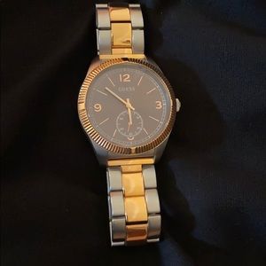 Guess Men’s rose gold and silver watch